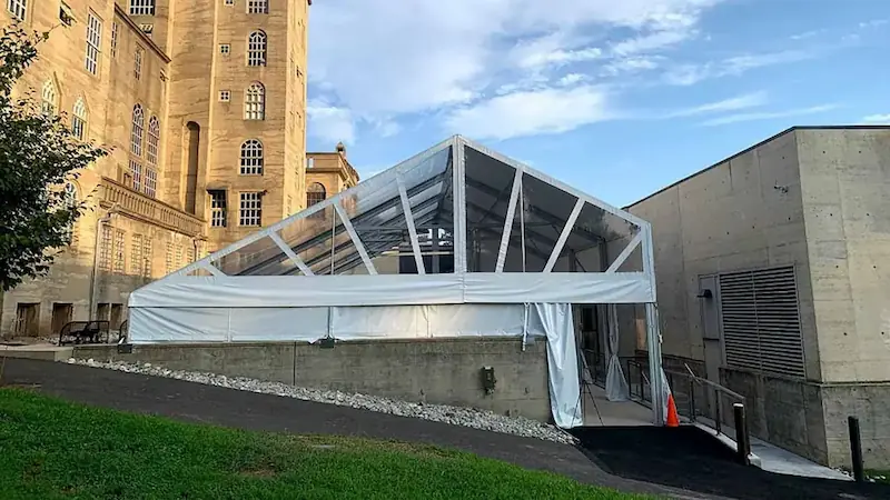 Who is Rainier Tent?